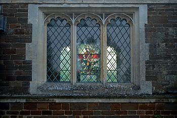 Stained glass in the west window of the nave of Old Saint Mary's May 2012